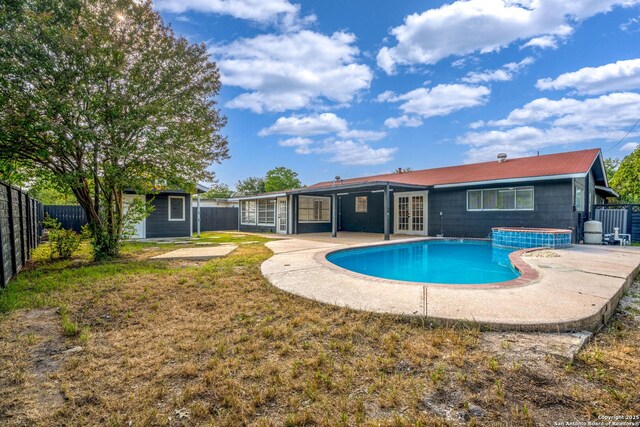 7626 Westfield, San Antonio, TX 78227 - back of house featuring a fenced backyard, french doors, an outdoor structure, and a patio area