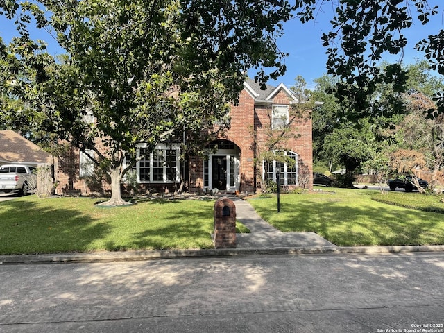19102 Weeping Oak, Spring, TX 77388 - view of front of property with a front lawn and brick siding