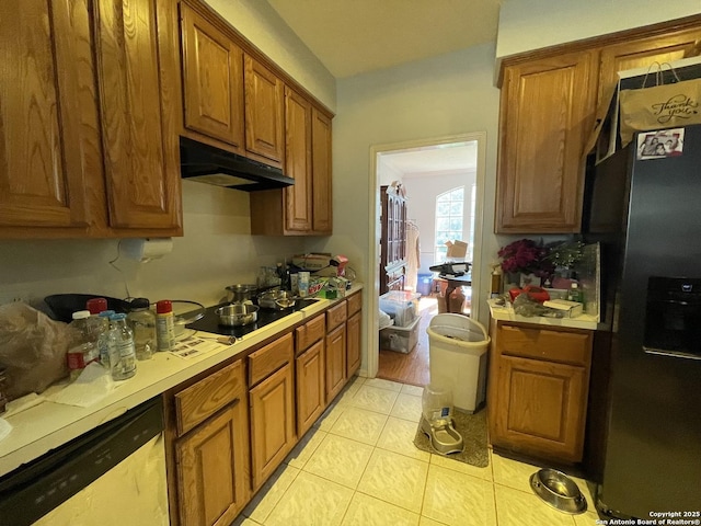 19102 Weeping Oak, Spring, TX 77388 - kitchen featuring stainless steel fridge, dishwasher, under cabinet range hood, black electric cooktop, and brown cabinets