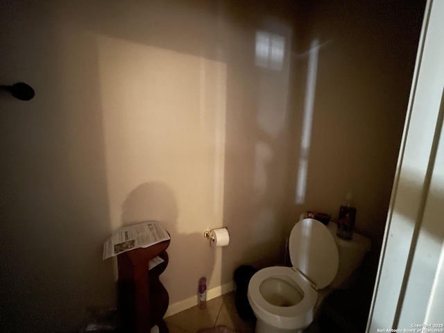 19102 Weeping Oak, Spring, TX 77388 - bathroom with baseboards, toilet, and tile patterned floors