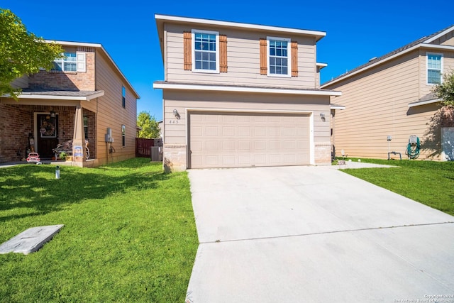 445 Auburn Park, Schertz, TX 78154 - view of front of home featuring an attached garage, driveway, a front yard, and brick siding