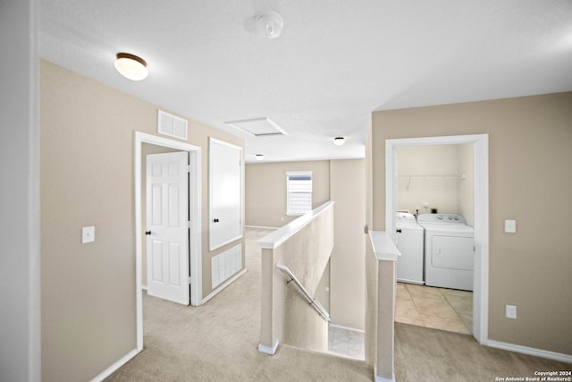 445 Auburn Park, Schertz, TX 78154 - hall featuring an upstairs landing, independent washer and dryer, light colored carpet, attic access, and baseboards