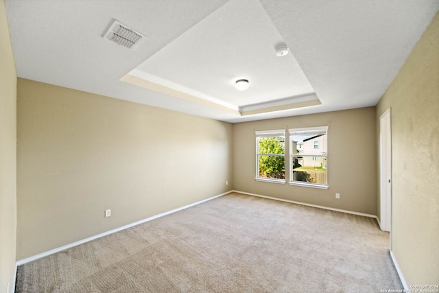 445 Auburn Park, Schertz, TX 78154 - unfurnished room with carpet flooring, a tray ceiling, baseboards, and a smoke detector