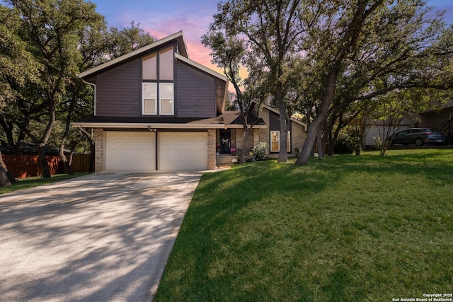 2930 Low Oak St, San Antonio, TX 78232 - view of front facade with brick siding, a garage, and concrete driveway