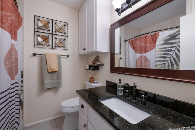 2930 Low Oak St, San Antonio, TX 78232 - full bathroom featuring toilet, vanity, tile patterned floors, baseboards, and a shower with shower curtain