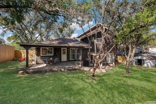 2930 Low Oak St, San Antonio, TX 78232 - back of property featuring a patio, a shed, and an outbuilding