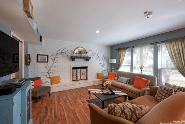 2930 Low Oak St, San Antonio, TX 78232 - living area featuring brick wall and wood finished floors