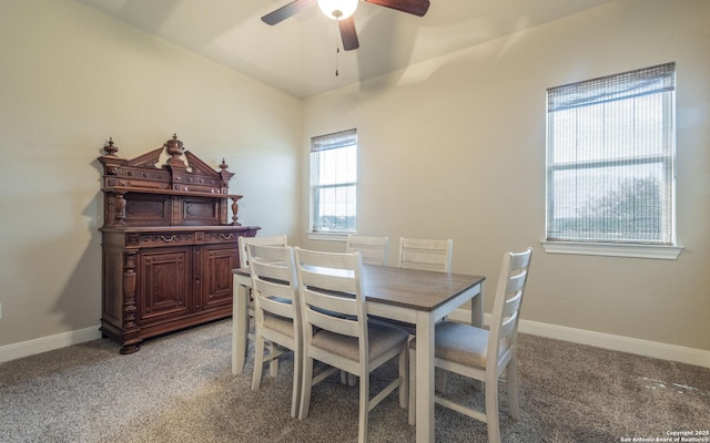 22793 N Cranes Mill Rd, Canyon Lake, TX 78133 - dining area with light colored carpet, a ceiling fan, baseboards, and lofted ceiling