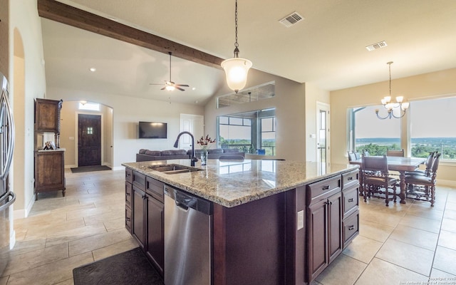 22793 N Cranes Mill Rd, Canyon Lake, TX 78133 - kitchen with a sink, stainless steel dishwasher, pendant lighting, arched walkways, and open floor plan