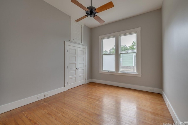 302 Cedar, San Antonio, TX 78210 - unfurnished room with light wood-type flooring, baseboards, a ceiling fan, and lofted ceiling
