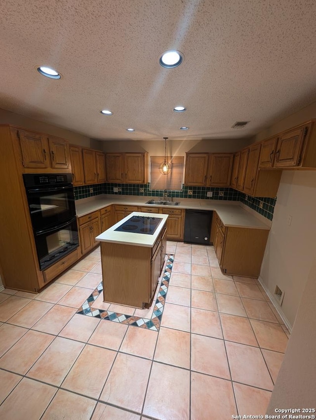 6410 Firestone, San Antonio, TX 78244 - kitchen featuring black appliances, a sink, decorative backsplash, a textured ceiling, and a kitchen island