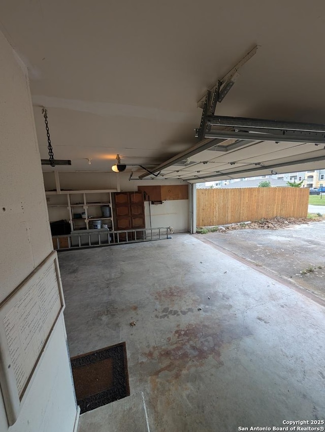 6410 Firestone, San Antonio, TX 78244 - garage with a garage door opener