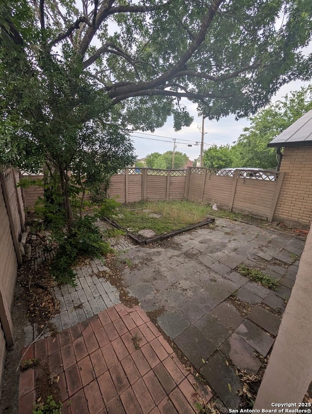 6410 Firestone, San Antonio, TX 78244 - view of patio / terrace featuring a fenced backyard