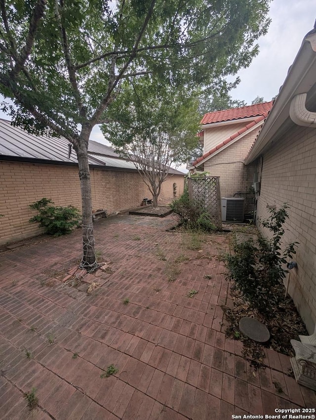 6410 Firestone, San Antonio, TX 78244 - view of patio / terrace featuring central AC