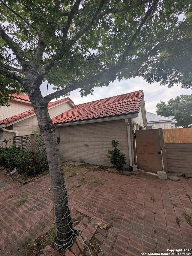 6410 Firestone, San Antonio, TX 78244 - view of patio with fence and a gate