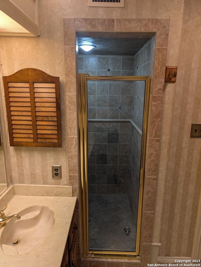 6410 Firestone, San Antonio, TX 78244 - bathroom featuring a stall shower and vanity