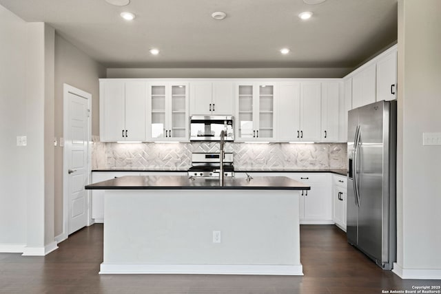 12414 Mineshaft, San Antonio, TX 78254 - kitchen with appliances with stainless steel finishes, dark countertops, dark wood-type flooring, and recessed lighting