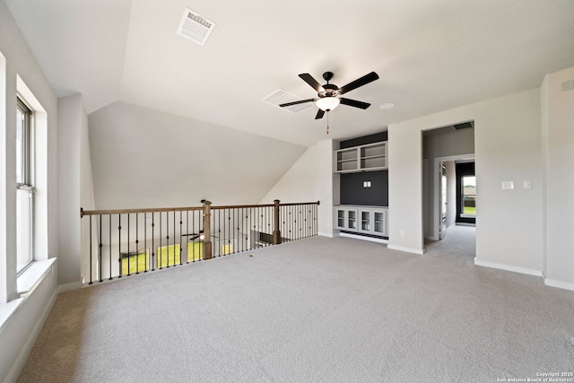 12414 Mineshaft, San Antonio, TX 78254 - carpeted spare room featuring a ceiling fan, baseboards, and lofted ceiling