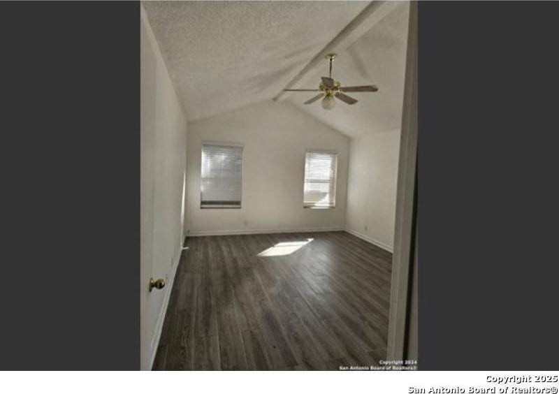 4614 Acacia Woods, San Antonio, TX 78249 - empty room featuring a ceiling fan, baseboards, lofted ceiling, wood finished floors, and a textured ceiling