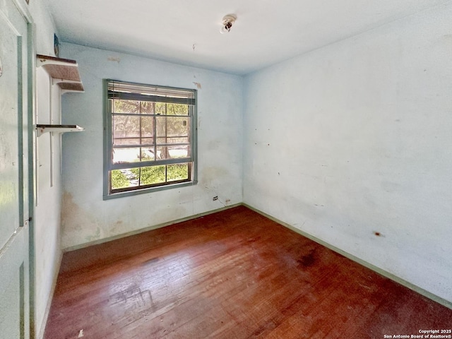 235 Notre Dame, San Antonio, TX 78228 - spare room featuring wood finished floors and baseboards