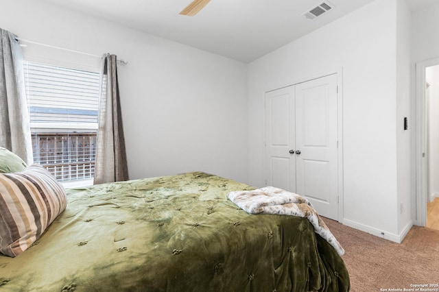 5903 Geronimo, Seguin, TX 78155 - bedroom featuring light colored carpet, a closet, baseboards, and a ceiling fan