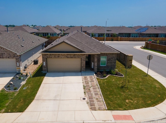 5903 Geronimo, Seguin, TX 78155 - ranch-style house featuring a residential view, brick siding, a garage, and concrete driveway