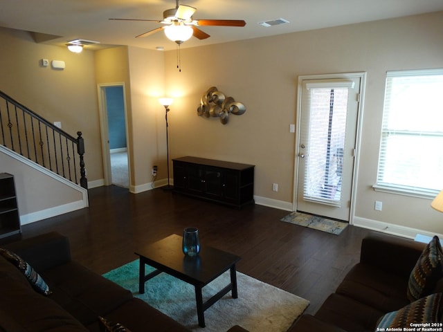 7622 Ruger Rnch, San Antonio, TX 78254 - living area with ceiling fan, dark wood finished floors, stairs, and baseboards