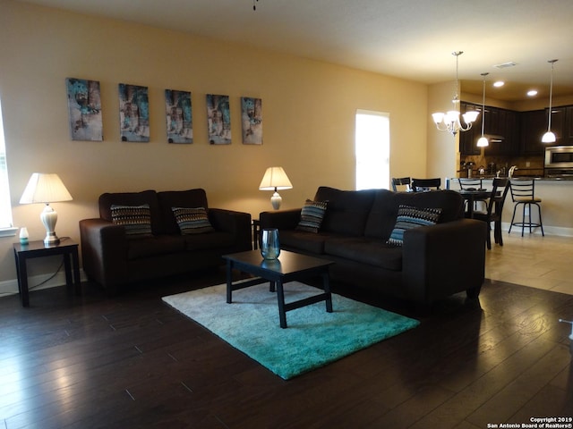 7622 Ruger Rnch, San Antonio, TX 78254 - living room featuring a chandelier, dark wood-type flooring, recessed lighting, and baseboards