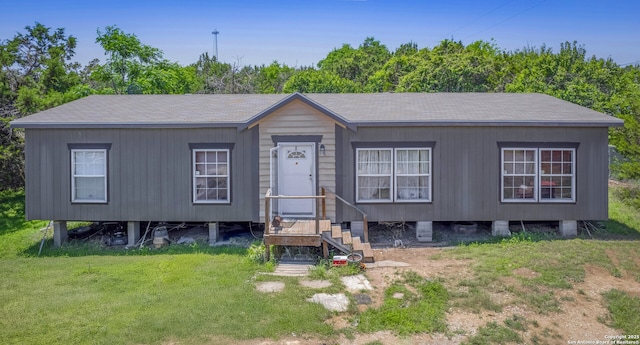 15411 Cranes Mill Rd, Canyon Lake, TX 78133 - manufactured / mobile home featuring a front lawn