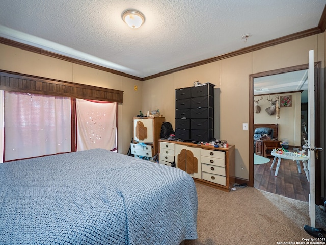 15411 Cranes Mill Rd, Canyon Lake, TX 78133 - carpeted bedroom featuring ornamental molding and a textured ceiling