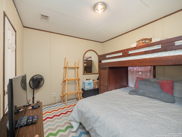 15411 Cranes Mill Rd, Canyon Lake, TX 78133 - carpeted bedroom featuring ornamental molding