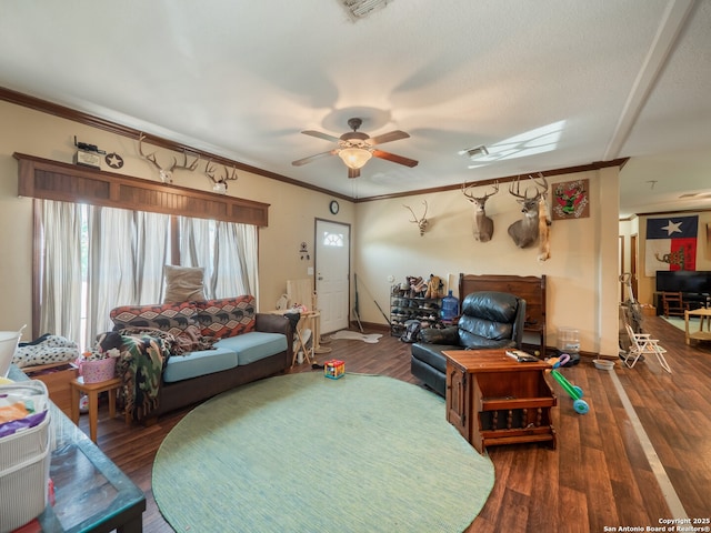 15411 Cranes Mill Rd, Canyon Lake, TX 78133 - living room with ornamental molding, baseboards, ceiling fan, and wood finished floors