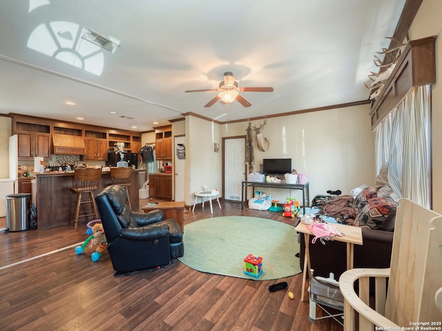 15411 Cranes Mill Rd, Canyon Lake, TX 78133 - living area featuring a ceiling fan, dark wood-style flooring, crown molding, and recessed lighting