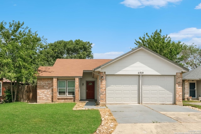 6909 Quail Lk, San Antonio, TX 78244 - ranch-style home with a garage, brick siding, and driveway