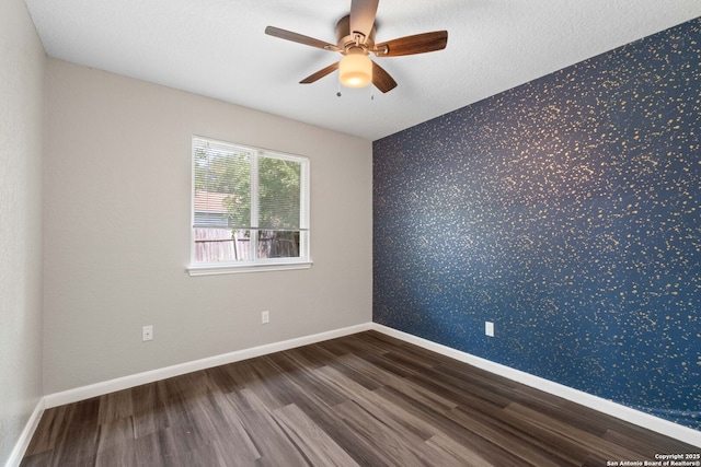 6909 Quail Lk, San Antonio, TX 78244 - empty room featuring wallpapered walls, wood finished floors, ceiling fan, and baseboards