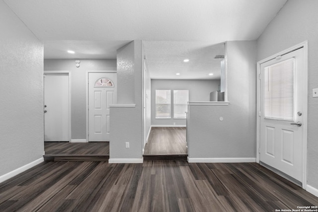 6909 Quail Lk, San Antonio, TX 78244 - entrance foyer with wood finished floors, baseboards, and recessed lighting