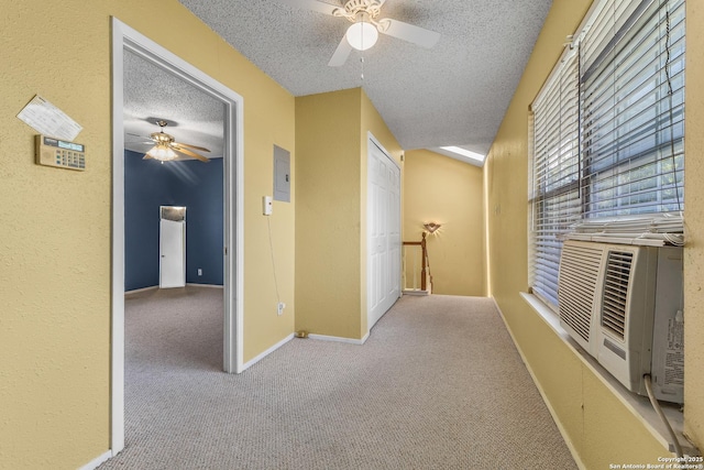 1605 W Winnipeg, San Antonio, TX 78225 - hallway with a textured ceiling, carpet, and baseboards