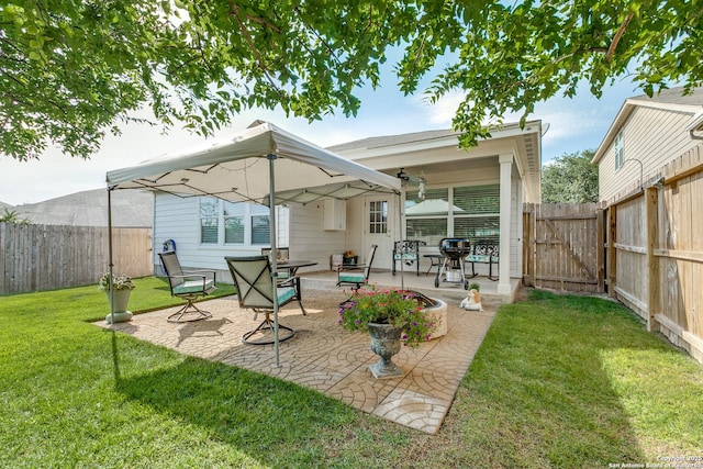 11014 Palomino, San Antonio, TX 78245 - rear view of property with a patio area, a gate, and a gazebo