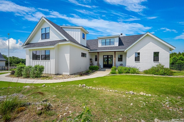 340 Warbler, Spring Branch, TX 78070 - modern inspired farmhouse featuring french doors, a shingled roof, a front lawn, and board and batten siding