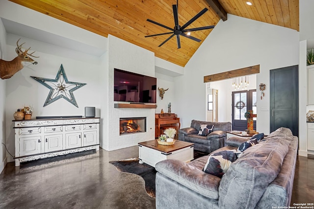340 Warbler, Spring Branch, TX 78070 - living room with wooden ceiling, ceiling fan, high vaulted ceiling, finished concrete floors, and a fireplace