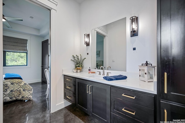 340 Warbler, Spring Branch, TX 78070 - bathroom featuring concrete flooring, vanity, a ceiling fan, baseboards, and ensuite bathroom