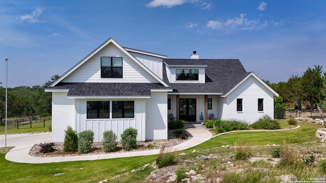 340 Warbler, Spring Branch, TX 78070 - modern farmhouse featuring board and batten siding, roof with shingles, a chimney, and french doors