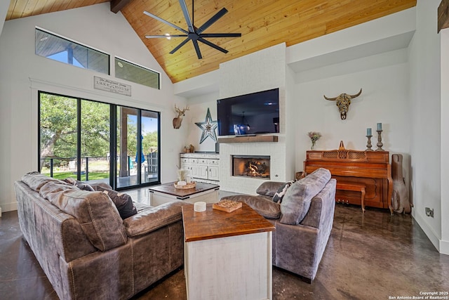 340 Warbler, Spring Branch, TX 78070 - living area featuring concrete flooring, wooden ceiling, high vaulted ceiling, baseboards, and a ceiling fan