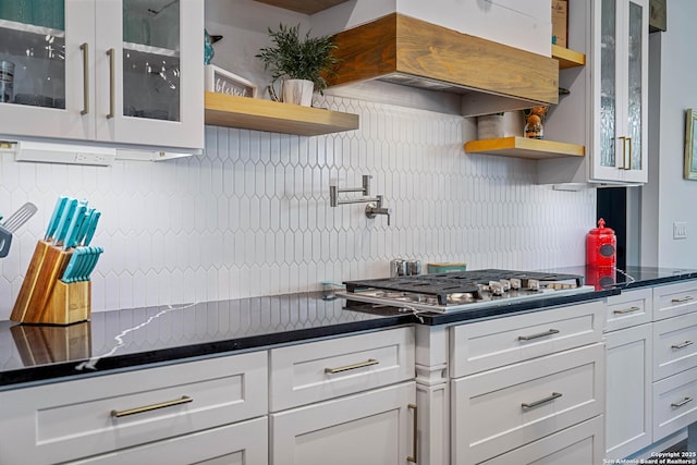 340 Warbler, Spring Branch, TX 78070 - kitchen with open shelves, stainless steel gas cooktop, backsplash, and white cabinetry