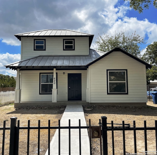 620 Euclid, San Antonio, TX 78212 - bungalow-style home with a standing seam roof, a porch, a metal roof, and a fenced front yard