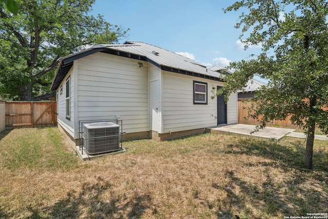 620 Euclid, San Antonio, TX 78212 - rear view of house with a fenced backyard, a metal roof, and a patio area