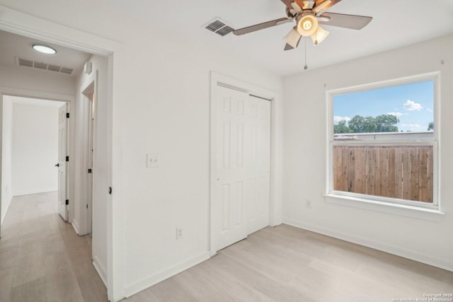 620 Euclid, San Antonio, TX 78212 - unfurnished bedroom featuring light wood-type flooring, a closet, and ceiling fan