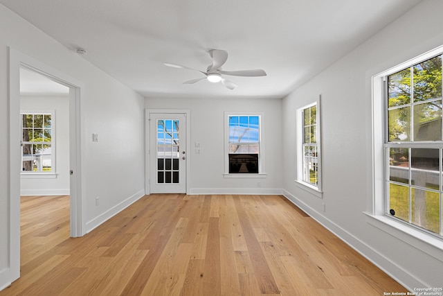 20505 Flat Creek Dr, Chandler, TX 75758 - empty room featuring light wood-style flooring, healthy amount of natural light, and baseboards
