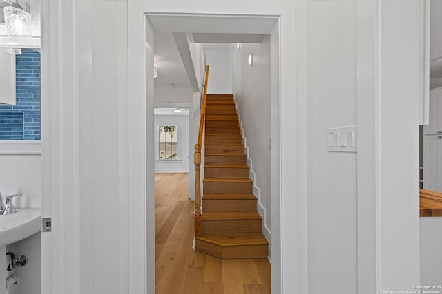 20505 Flat Creek Dr, Chandler, TX 75758 - stairs featuring wood finished floors
