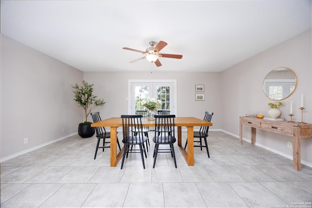 10511 Stone Crk, San Antonio, TX 78254 - dining room with a ceiling fan, light tile patterned floors, and baseboards